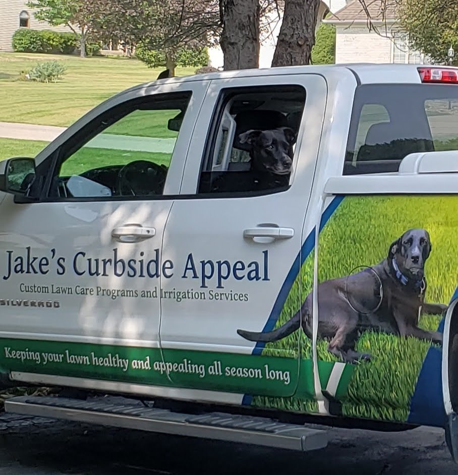 Jake looking out the window of the first work truck