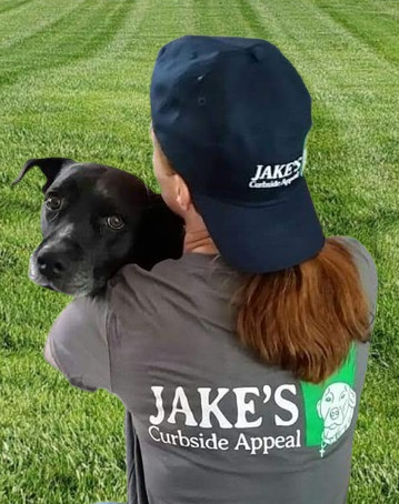 Jake looking over his owner's wife's shoulder